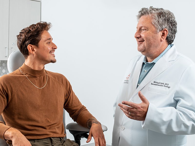 Photo of Dr. Safir speaking to a patient
