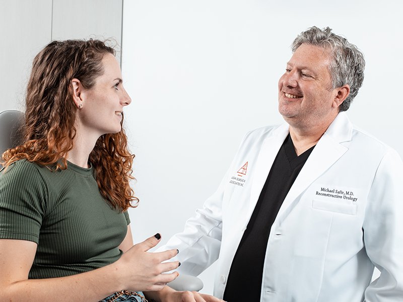 Photo of Dr. Safir talking to a patient