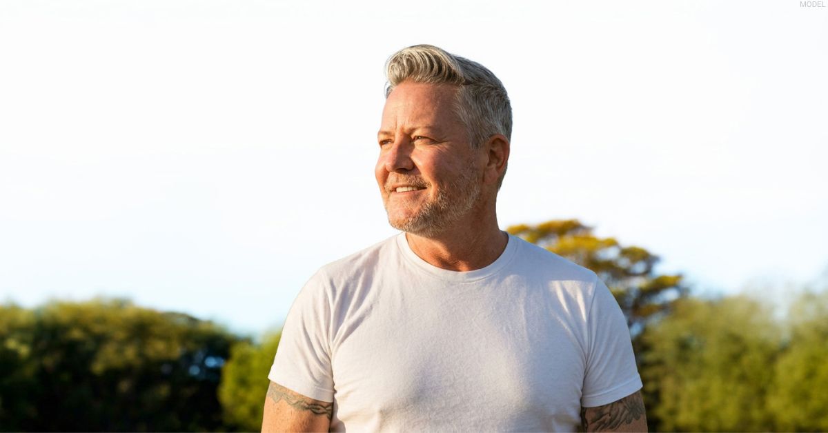 Man considering if he should choose Metoidioplasty or Phalloplasty (model)